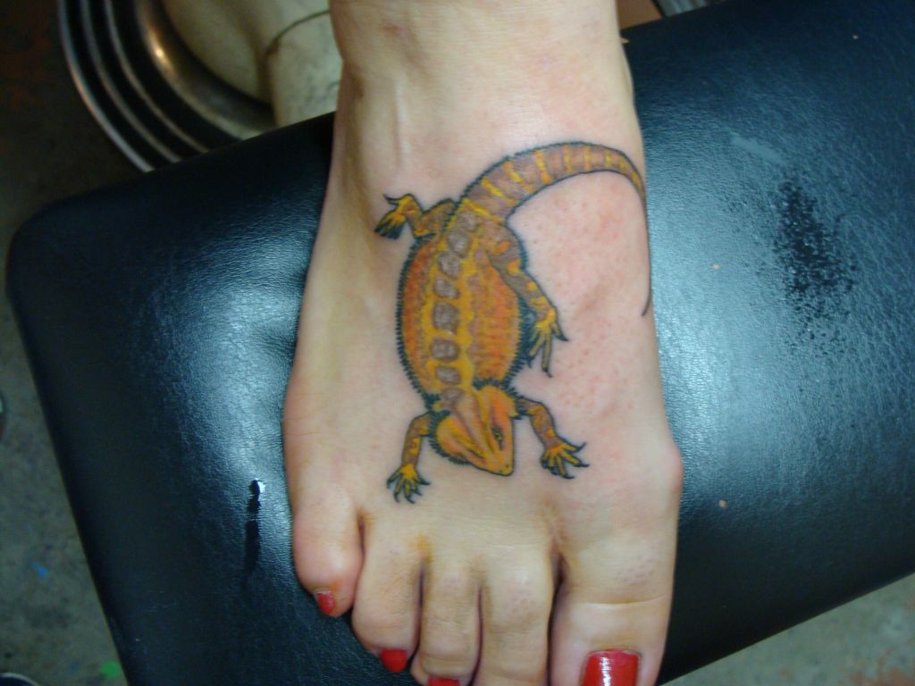 Bearded Dragon Eye Hand Tattoo by Jeff Mansolf TattooNOW